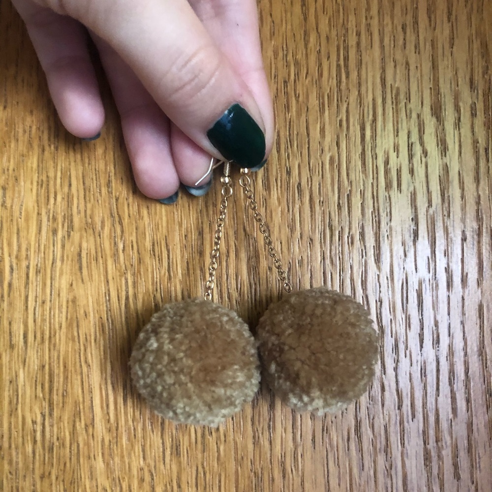 Tan pom pom earrings